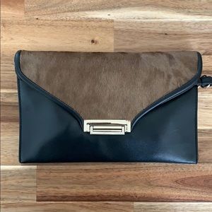 Inzi leather clutch